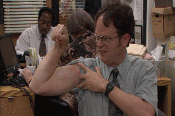 dwight gun show gif